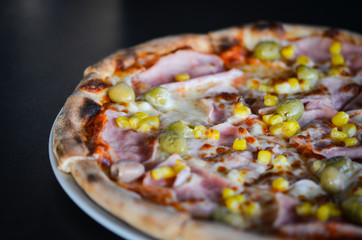 tasty italian pizza with fresh ingredients & vegetables