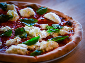 tasty italian pizza with fresh ingredients & vegetables