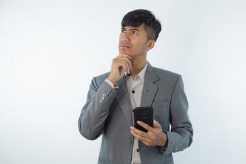 Young business asian man thinking of an idea isolated on white background.