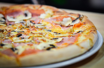 tasty italian pizza with fresh ingredients & vegetables