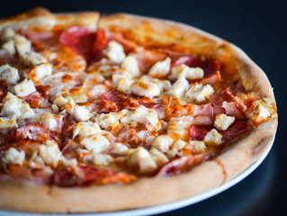 tasty italian pizza with fresh ingredients & vegetables