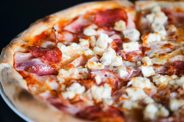 tasty italian pizza with fresh ingredients & vegetables