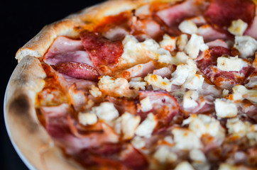 tasty italian pizza with fresh ingredients & vegetables