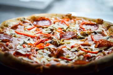 tasty italian pizza with fresh ingredients & vegetables