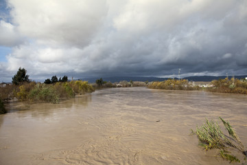 Spain guadalquivir River to the point of overflow caused by heavy rains, Andajar, Jaen province, Andalusia, Spain