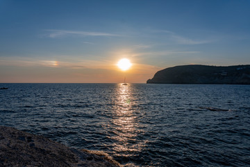 Ischia island in Sant Angelo, view from the sea at sunset 
