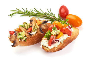 Spanish Tapas and Pinchos with champignon mushrooms, tomatoes, cottage cheese and herbs, isolated on white background