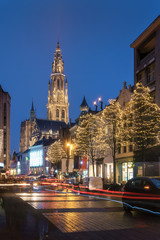Fototapeta premium Cathedral of Our Lady with car light trail, Antwerpen Belgium at twilight in portrait