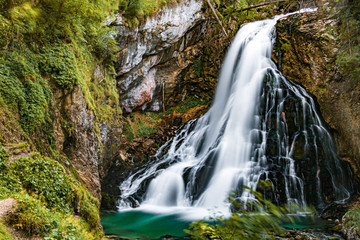 Beautiful alpine river view with silky water effect at the famous Golling Waterfall, Salzburg, Austria