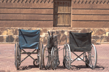 Naklejka na ściany i meble Photo of the old wheel chairs