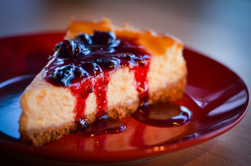 home made cheese cake with cherry jam