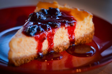 home made cheese cake with cherry jam