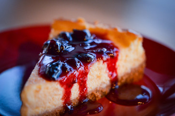 home made cheese cake with cherry jam
