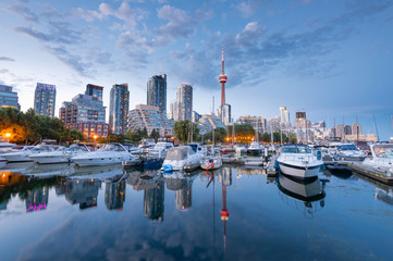 Fototapeta na wymiar Toronto city skyline at night from harbourfront, Ontario, Canada