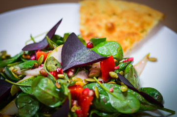 mix salad with fresh vegetables, lettuce & foccacia bread