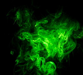 Green smoke on black background