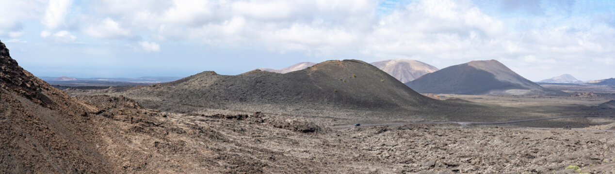 Panoramic picture of the various volcano craters in the national park Parque Nacional de Timanfaya, Lanzarote, Spain