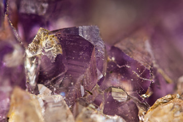 Crystals. Structure of the stone. Beautiful background from purple natural material. Macro