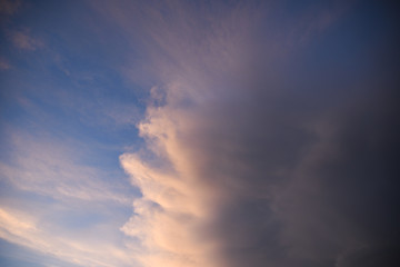 Fototapeta na wymiar Beautiful cloudy sky with sun rays. Cloudy abstract background. Sunset light.