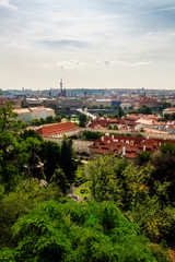 Naklejka premium View on Prague panorama with red roofs and historic architecture