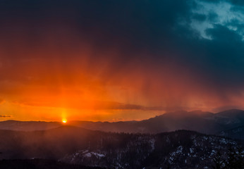 Sun passing through rain in winter