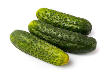 three gherkins white background