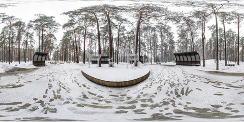 Winter full spherical seamless hdri panorama 360 degrees angle view on pedestrian road in snowy...