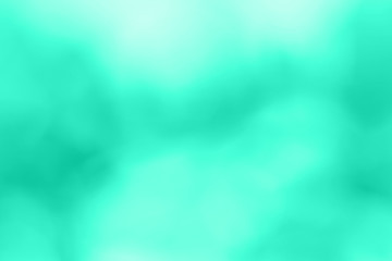 Fototapeta na wymiar Abstrast blurred background toned in trendy mint leaf green