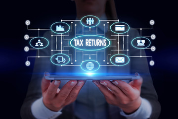 Text sign showing Tax Returns. Business photo showcasing Tax payer financial information Tax Liability and Payment report Woman wear formal work suit presenting presentation using smart device