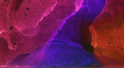 Deep dark bright blue, pink and purple alcohol ink neon abstract background. Flow liquid watercolor...