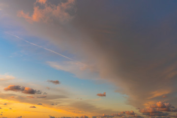 Mystical sky with dark clouds at sunset. Very beautiful evening time. Golden hour.