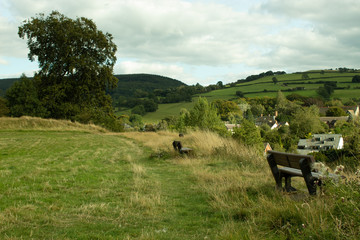 Bench at green field