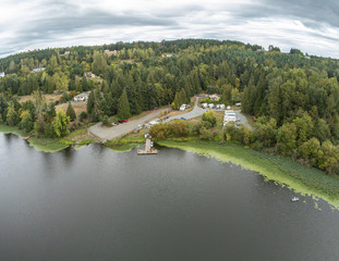 Iridescent aerial photography of breathtaking Harts Lake from Pierce County in Roy, Washington