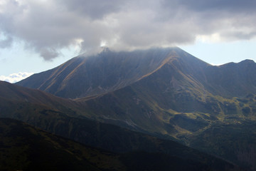 tatra mountains in national park poland in fog cloud