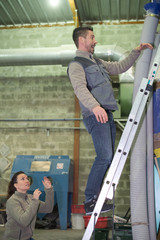 worker falling off the ladder