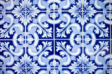 Typical portuguese wall ceramic titles azulejo blue and white ornament