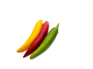 close-up of three fresh and healthy chili peppers isolated on white background. Selective focus.