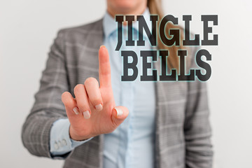 Word writing text Jingle Bells. Business photo showcasing Most famous traditional Christmas song all over the world Digital business concept with business woman