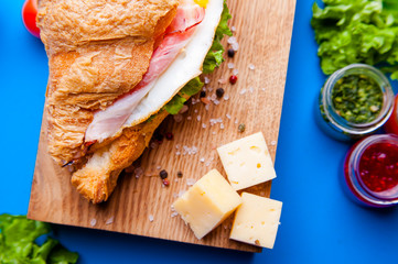 Fresh Croissant Sandwich with Ham, Cheese, Thyme and figs Breakfast Delicious Baking Refreshment