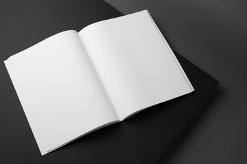 Empty book pages on dark background. Mockup for design