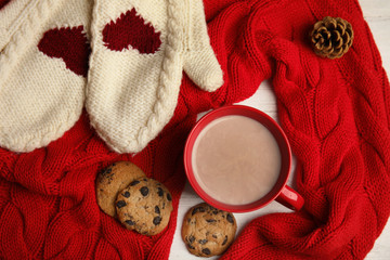 Flat lay composition with cup of hot cocoa on table. Winter drink