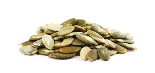 Pile of raw pumpkin seeds on white background