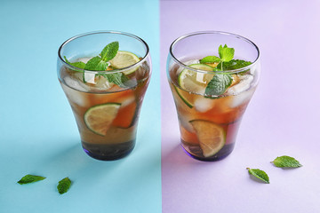 Glasses of refreshing iced tea on color background