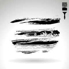 Black brush stroke and texture. Grunge vector abstract hand - painted element. Underline and border design.