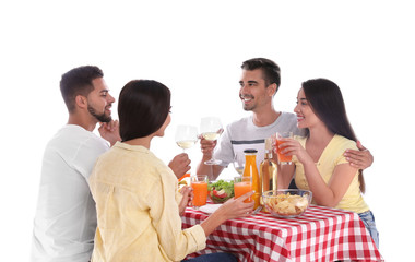 Group of friends at picnic table against white background