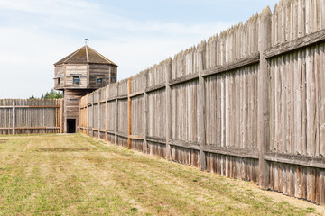 Fototapeta na wymiar USA, Washington State, Fort Vancouver National Historic Site. Stockade wall and watchtower at the Hudson's Bay Company's Fort Vancouver.
