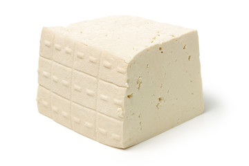 Raw tofu, white background.