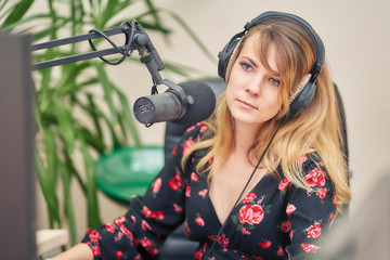 Woman voicing a cartoon in a recording studio