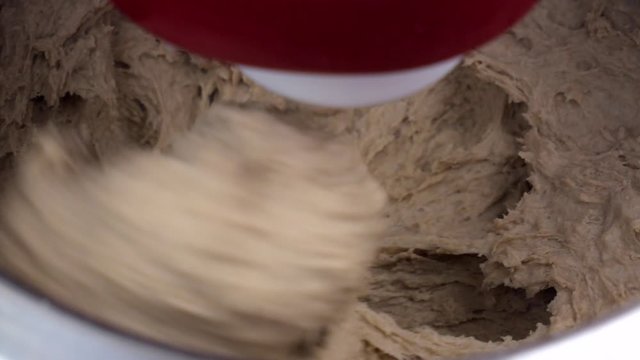 Preparation of homemade bread - Kitchen mixer stirs the dough