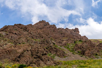 blue sky over the rocky hill